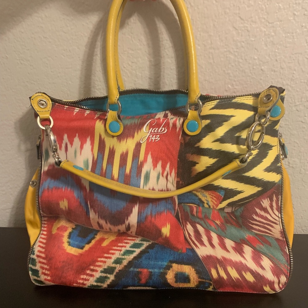 Gabs genuine leather Italian convertible bag.